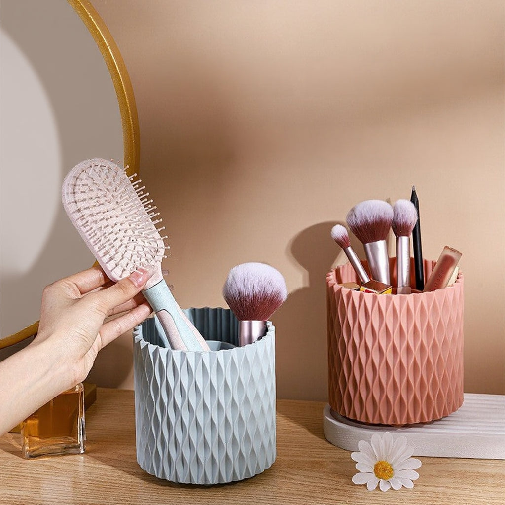 Rotating makeup brush organizer on a dressing table with brushes